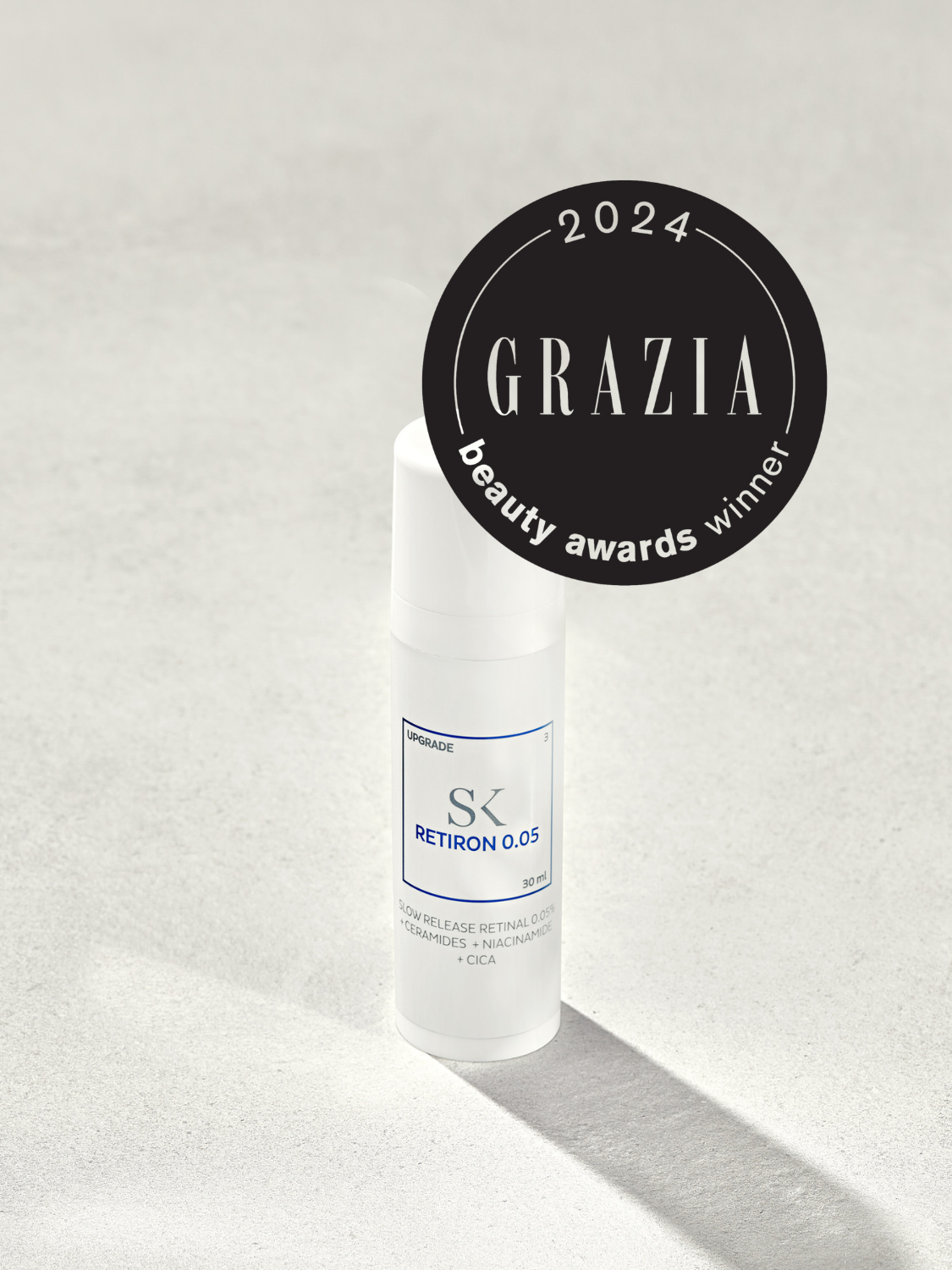 Skintegra Retiron 0.05 sa 0.05% retinala, ceramidima, niacinamidom i cicom u bočici sa Grazia nagradom